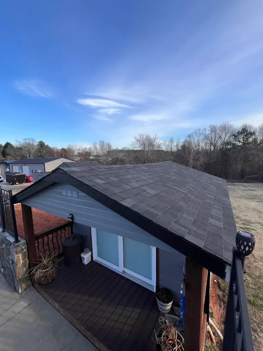Finished asphalt shingle roof replacement on a home with covered porch, Rutherford County NC