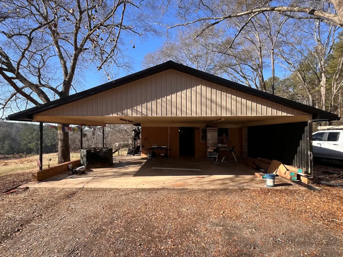 Metal roof and siding on a covered carport and workshop